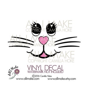 May include: Black and white cat face with pink nose and heart-shaped eyes. The image includes the text "All I Make" and "Copyright Camilla Hoke".