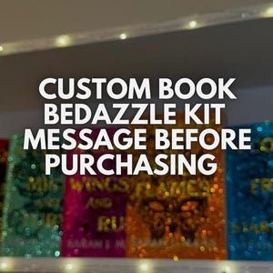May include: A set of four custom book bedazzled kits. The books are covered in colorful sequins and glitter. The text "CUSTOM BOOK BEDAZZLE KIT MESSAGE BEFORE PURCHASING" is displayed above the books.