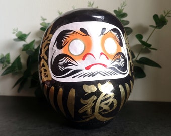 Poupée Daruma japonaise noire - 15 cm