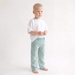 Toddler wearing pants made with simply pdf sewing pattern