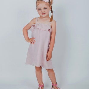Toddler summer dress sewn from a beginner PDF sewing pattern.
