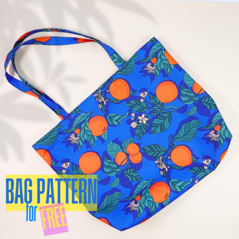 May include: A blue tote bag with a pattern of orange citrus fruit and green leaves. The text "BAG PATTERN for FREE" is on the bottom of the image.