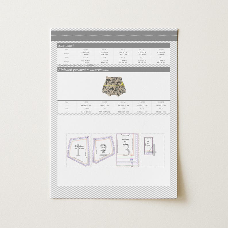 May include: A printed size chart and pattern pieces for sewing shorts. The chart includes measurements in inches. The shorts are beige with a pattern of various shapes and objects. The pattern pieces are labeled with numbers.
