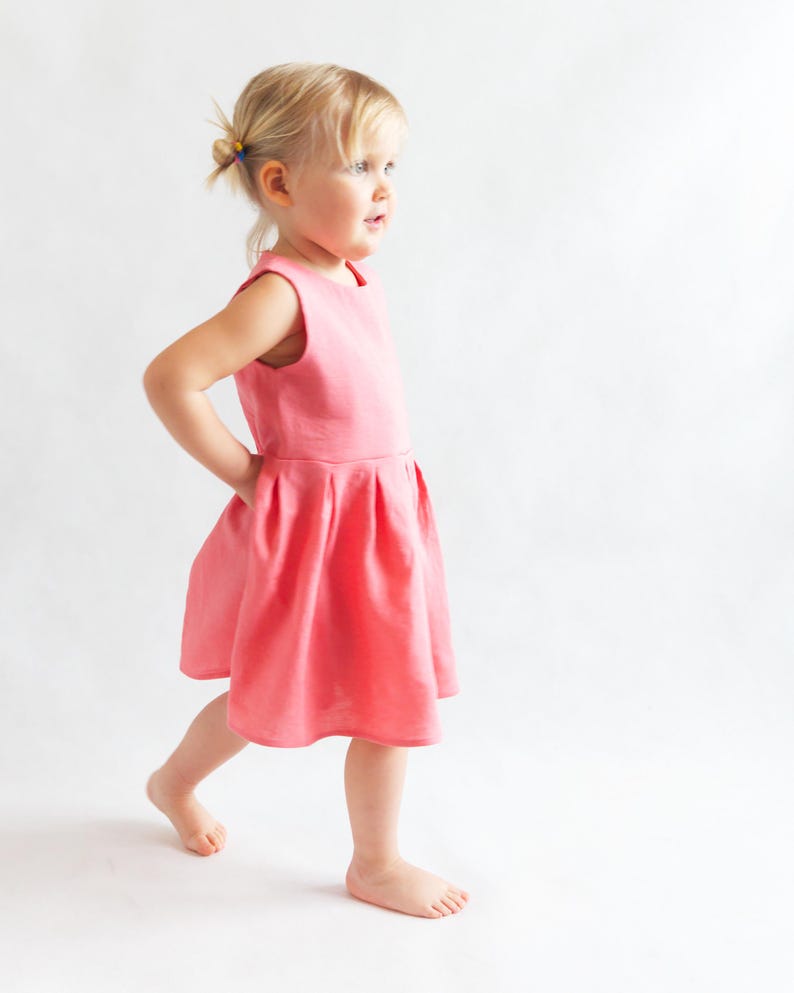 Side of kids dress with snap closure, sewn from digital sewing pattern