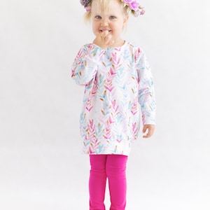 Toddler girl wearing soft leggings sewn from beginner-friendly PDF pattern