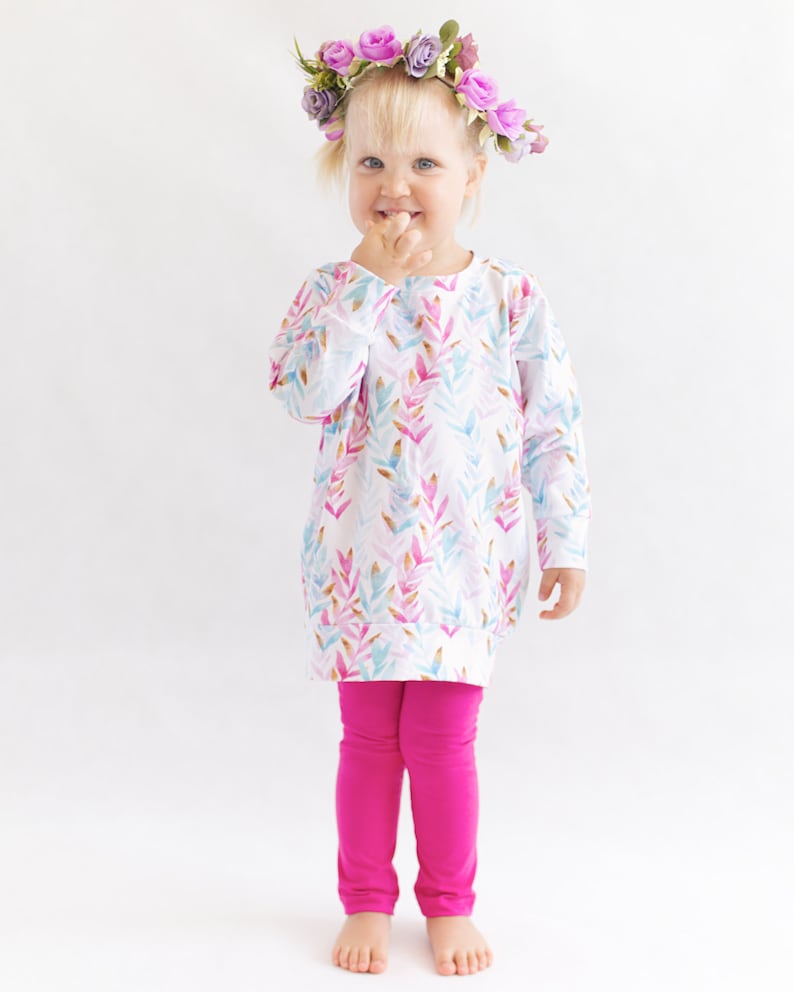Toddler girl wearing soft leggings sewn from beginner-friendly PDF pattern