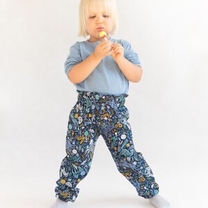 Back-to-school kids pants handmade from sewing PDF on the girl