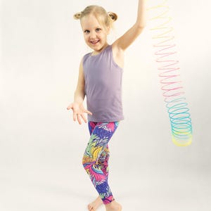 Girl wearing cuffed leggings with yoga waistband made with easy sewing pattern
