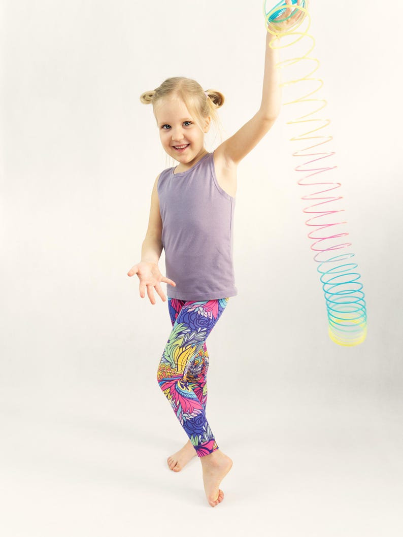 Girl wearing cuffed leggings with yoga waistband made with easy sewing pattern