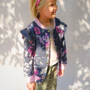 Toddler wearing bomber jacket – beginner DIY printable sewing pattern