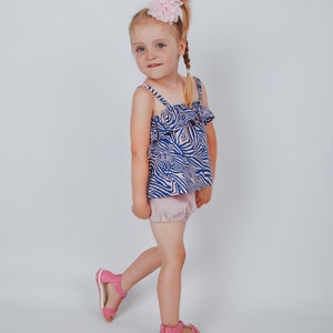 Handmade baby and kids summer outfit created with a linen sewing pattern.