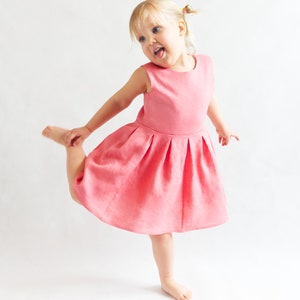 Toddler wearing handmade summer dress from PDF pattern in linen fabric made with super easy PDF pattern