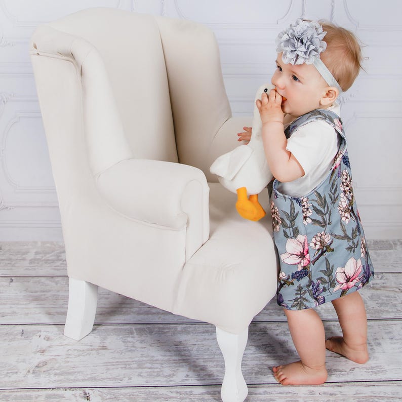 Cute overall dress for girls made with a printable sewing pattern.