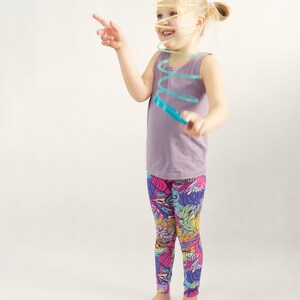 Girl wearing handmade leggings made from printable sewing pattern