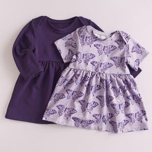 Easy baby dress sewing pattern example for infants, comfortable everyday baby clothing.