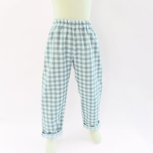 May include: A set of three ceramic mugs with a speckled, matte finish. The mugs are in shades of cream, light gray, and dark gray. Each mug has a simple, minimalist design, perfect for coffee or tea.