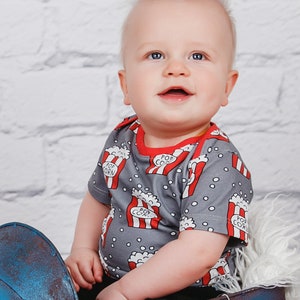 Baby boy wearing the shirt sewn from PDF pattern for beginners