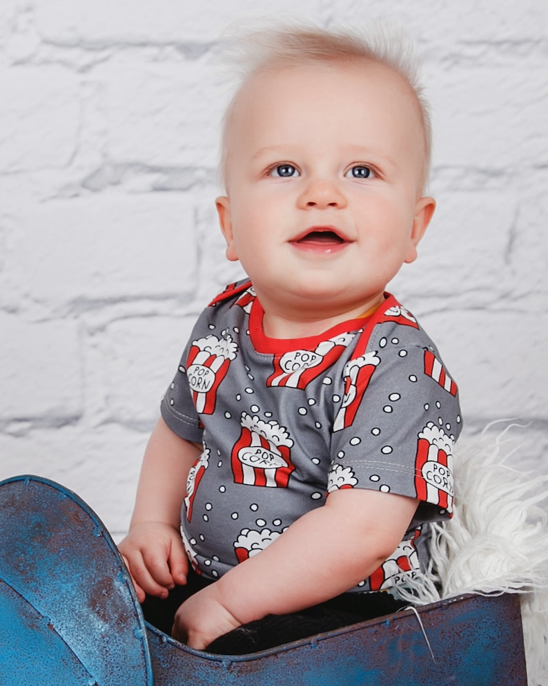Baby boy wearing the shirt sewn from PDF pattern for beginners