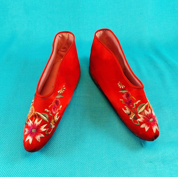 red embroidered shoes