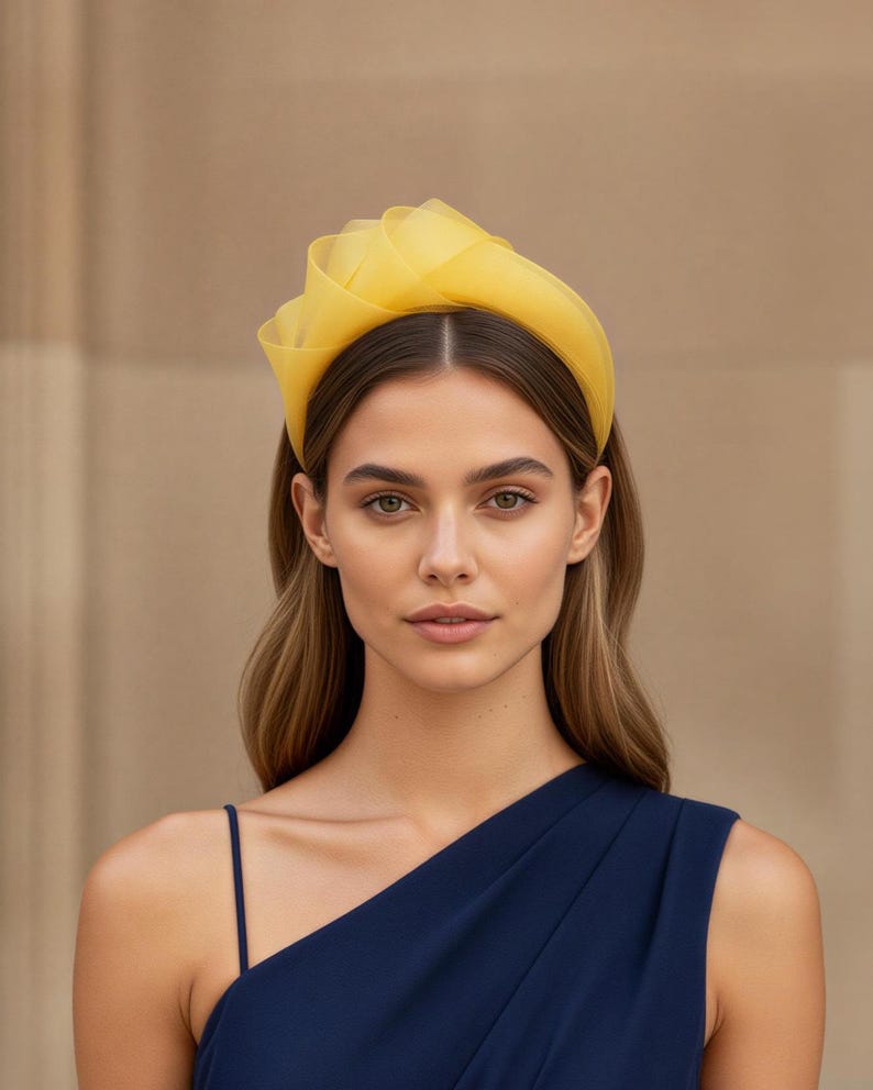 mustard yellow fascinator with navy blue dress for the races or weddings or church hat