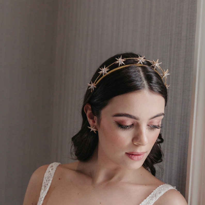 Gold star crown halo with luxury crystal stars worn by a petite dark haired italian model