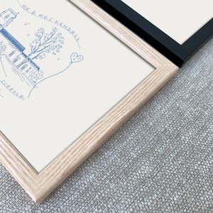 May include: A framed illustration of a church building with a tree and a heart-shaped balloon with the text "Mr & Mrs Kendall" and "Suffolk" written on the image.