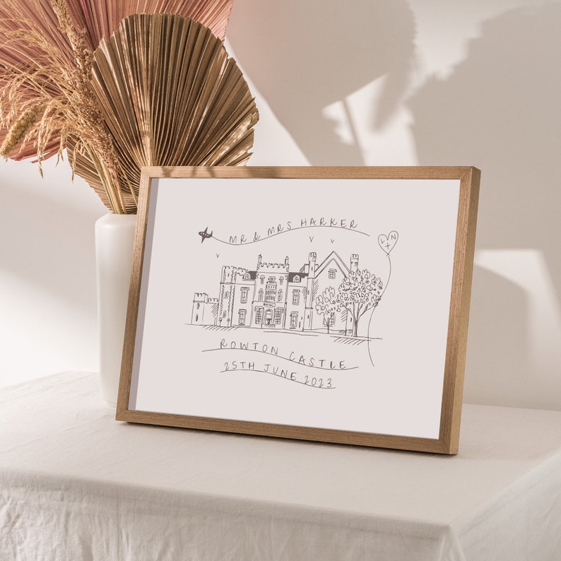 May include: A framed illustration of a castle with the text "Mr. & Mrs. Harker Rowton Castle 25th June 2023" and a heart with a plane above it.