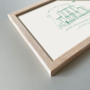 May include: A framed print with a hand-drawn illustration of a building with a heart balloon and the text "Mr & Mrs Clarke" and "York Register Office 13.07.2020".