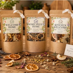 May include: Three brown kraft paper pouches containing stovetop simmer kits. Each pouch features a label with a house icon and text: Welcome Home, Home Sweet Home, and Kitchen Welcome. The pouches are tied with white ribbon at the top.