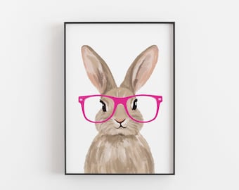 May include: A brown rabbit wearing pink glasses. The rabbit is looking directly at the viewer.