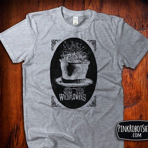 Tom Petty T Shirt You Belong Among The Wildflowers Etsy Wildflowers features petty's percussive acoustic strumming, with some heartbreakers behind him. usd