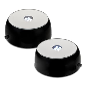 May include: Two black rotating display stands with a white circular platform and LED lights. The stands are ideal for displaying small items like crystals, figurines, or jewelry.
