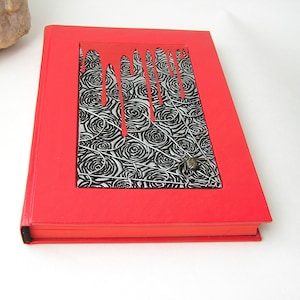 Vampire style notepad A5 in red with silver roses, golden spider, and blood drips.