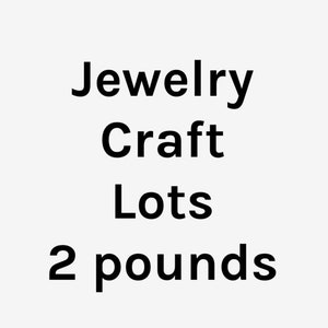 May include: Text on a white background reads "Jewelry Craft Lots 2 pounds". The text is in a bold, black font. The image suggests a collection of jewelry-making supplies or components, with a total weight of 2 pounds.