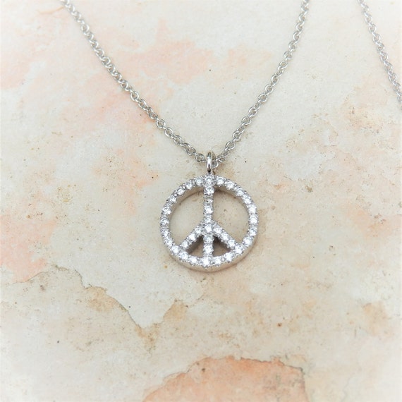white gold peace sign necklace