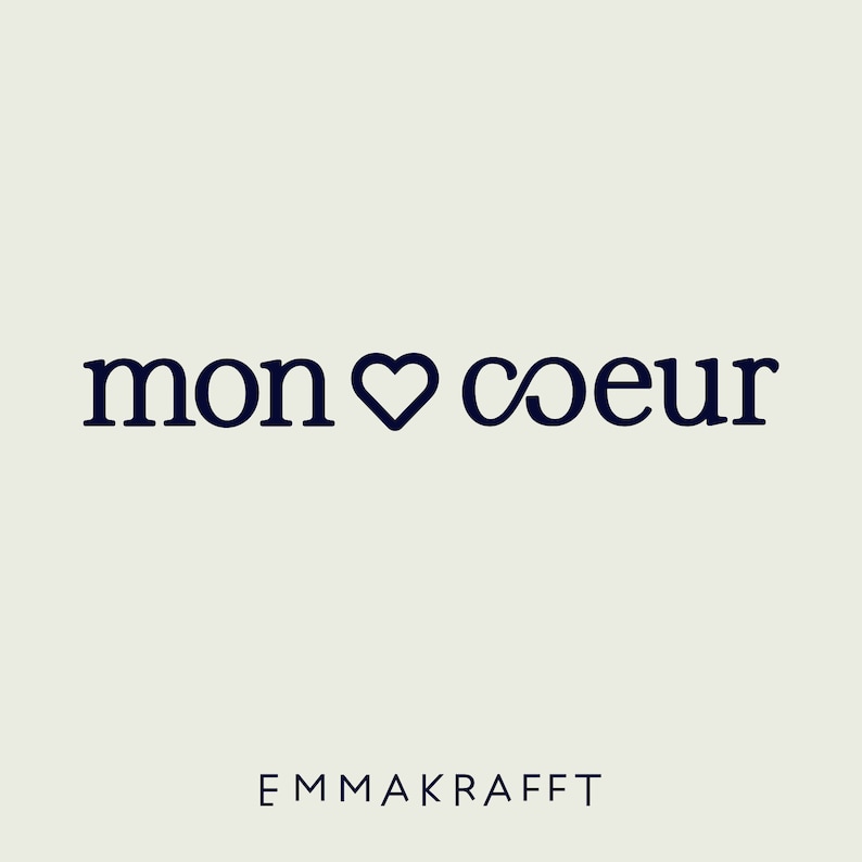 May include: A graphic design with the text "mon coeur" in a dark blue font with a heart symbol and an infinity symbol. The text "EMMA KRAFFT" is below the graphic in a smaller font.