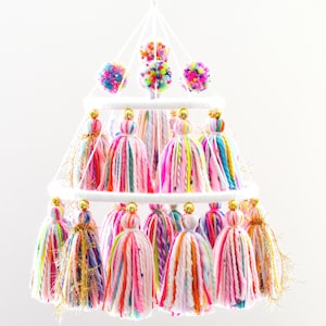 Yarn tassel and pompom mobile, in bright rainbow colors, for home decor and party decoration!