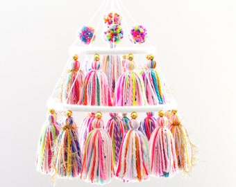 Yarn tassel and pompom mobile, in bright rainbow colors, for home decor and party decoration!