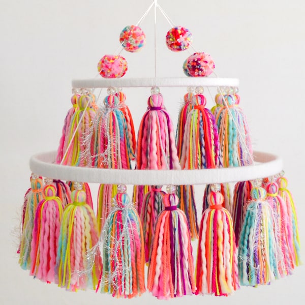 Yarn tassel and pompom mobile, in bright rainbow colors, for home decor and party decoration!