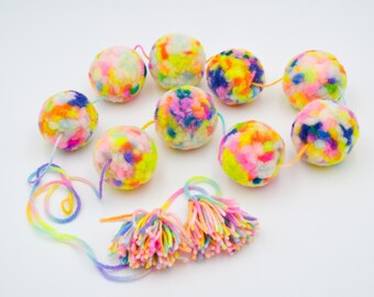 Pompom garland, in bright rainbow colors, for home decor and party decor!