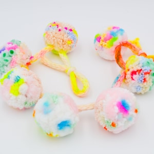 Colorful pompom garland for home decor and party decoration