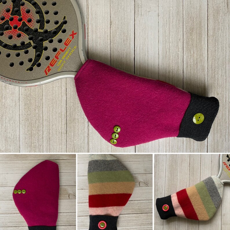 May include: Three different styles of paddle grip covers. One is a solid pink with green buttons, one is a striped pattern with a black cuff and a red button, and the last is a striped pattern with a black cuff and a green button.