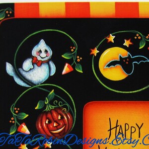 May include: A black and orange Halloween themed frame with a ghost, pumpkin, bat, and moon. The frame has a green vine design with candy corn accents. The text "Happy Halloween" is visible in the bottom right corner.