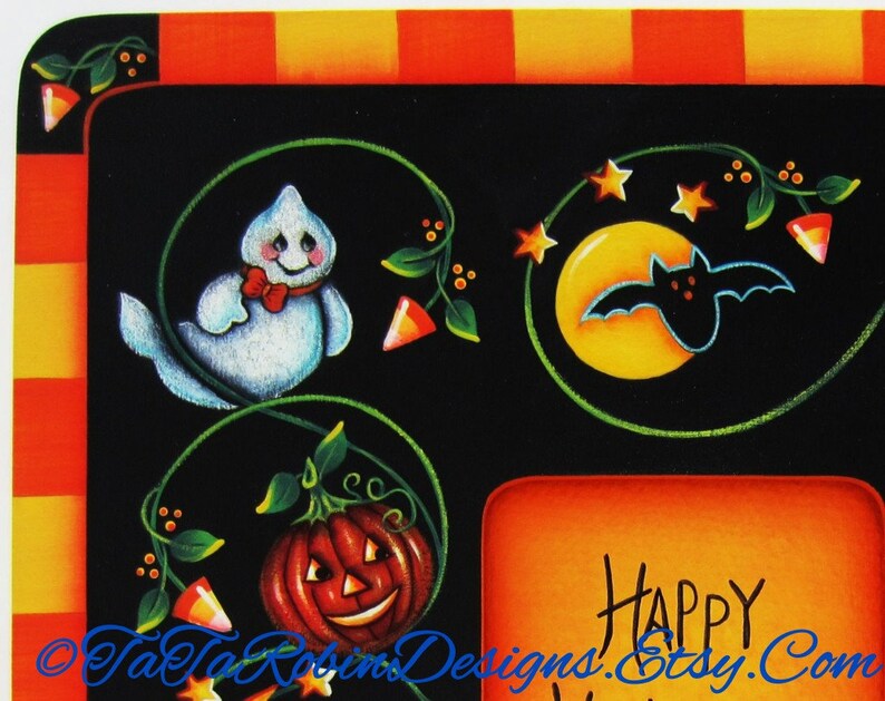 May include: A black and orange Halloween themed frame with a ghost, pumpkin, bat, and moon. The frame has a green vine design with candy corn accents. The text "Happy Halloween" is visible in the bottom right corner.