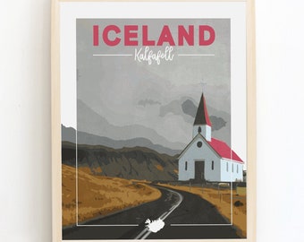 May include: A framed print of a vintage travel poster for Iceland. The poster features a white church with a red roof and a winding road leading to it. The text on the poster reads "ICELAND -  Kálfafell".