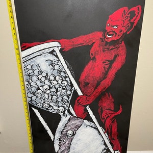 May include: A red demon figure with horns and a tail holds an hourglass filled with white skulls. The hourglass is on a black background with the word "PANDOREMA" written in white at the bottom.