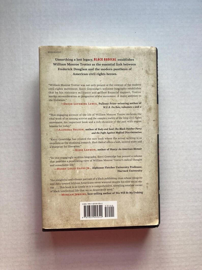 May include: Book cover featuring a black and white photograph of a man with a beard and glasses. The title of the book is "Black Radical" and the subtitle is "Unearthing a lost legacy, William Monroe Trotter as the essential link between Frederick Douglass and the modern pantheon of American civil rights heroes."