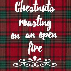 May include: A red and green plaid background with white text that reads "Chestnuts roasting on an open fire".