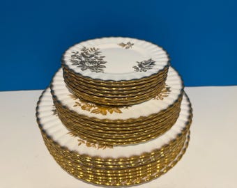 Set of 24 plates Royal Albert Golden Rose. Ca 1964. Dinner set for 8