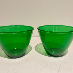 Set of two Mid Century Moderns Forest green glass Anchor Hocking bowls.